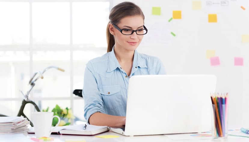 Student checking fees on laptop